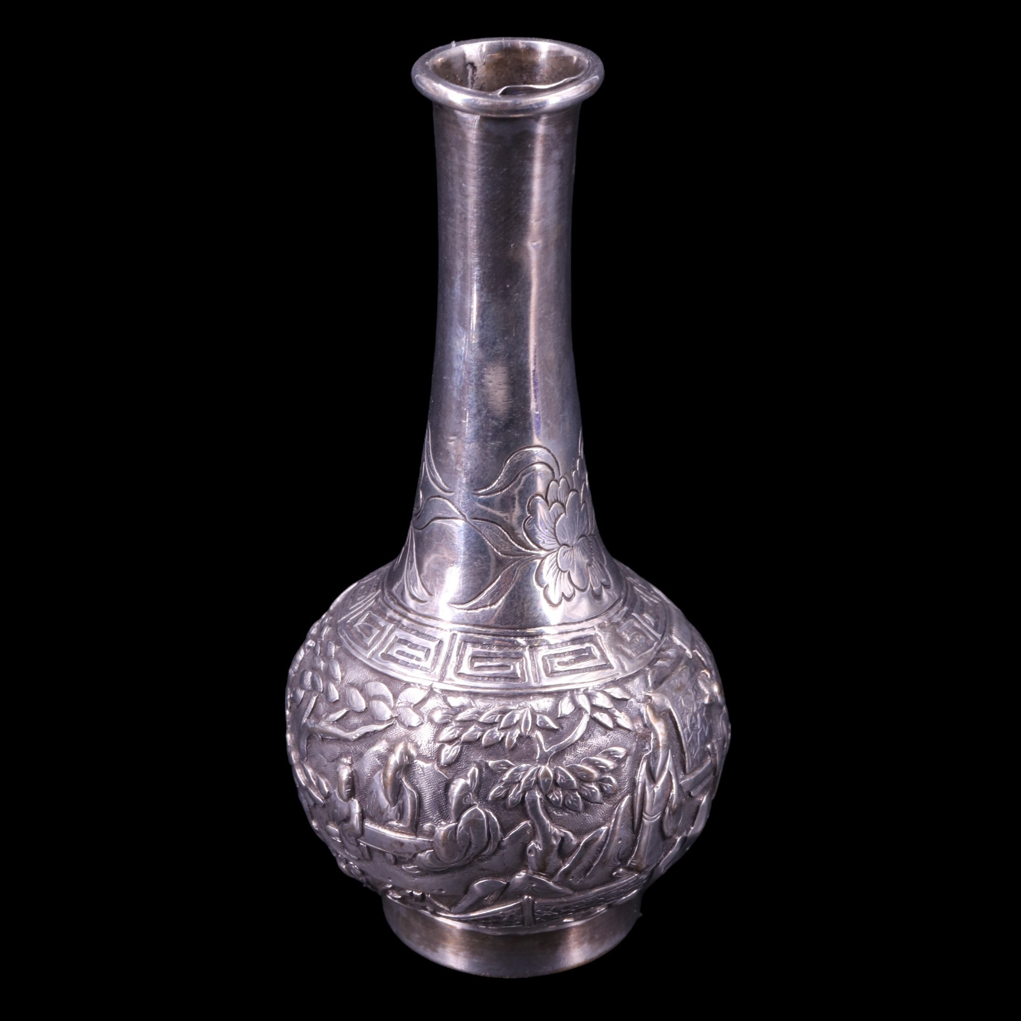 A late 19th / early 20th Century Canton silver bud vase, of bottle form, chased and engraved
