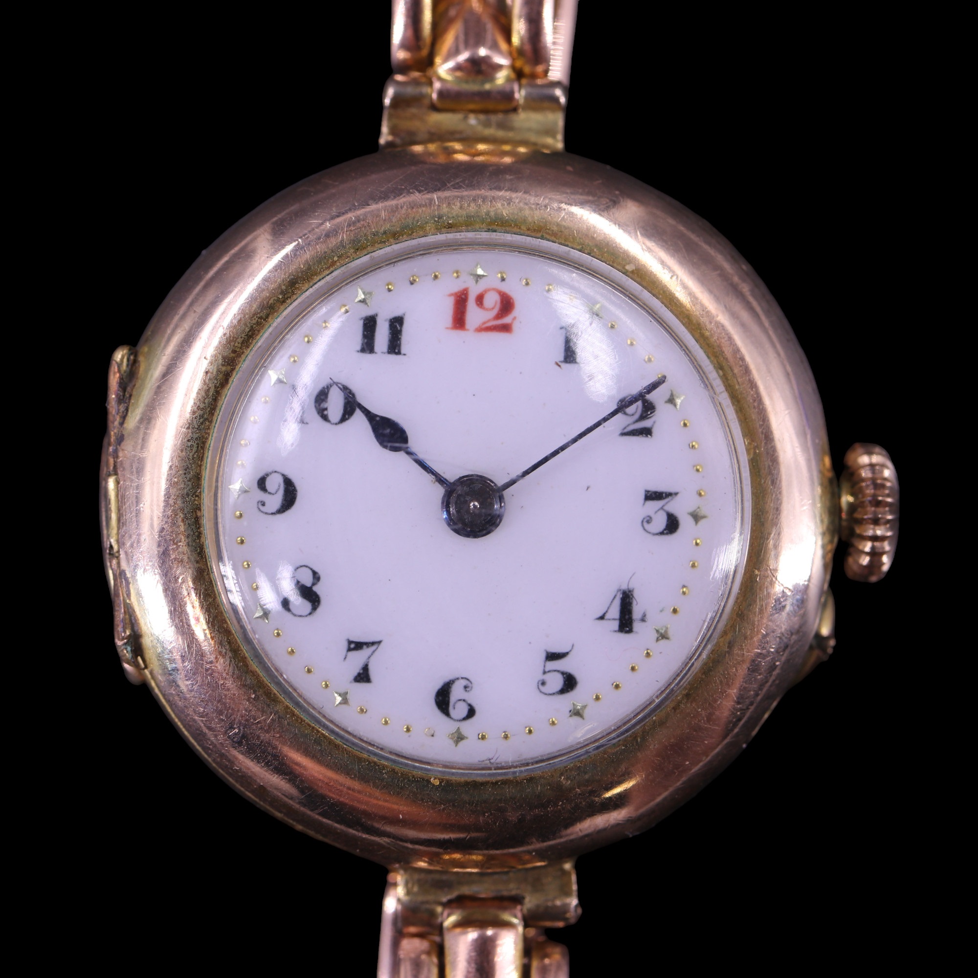 A 1920s lady's wristlet watch, having a 9ct yellow metal Britannic Patent bracelet strap, (