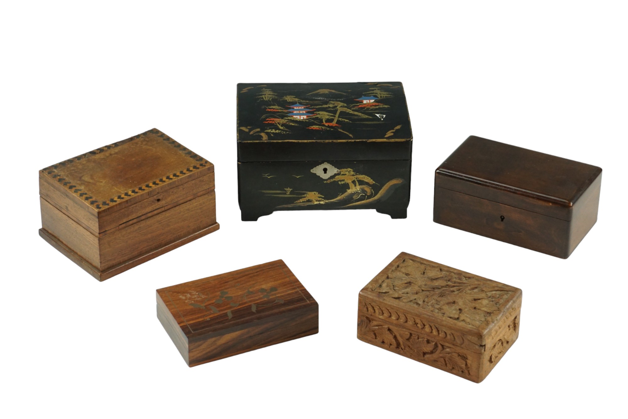 A mid 20th Century Japanese lacquered jewellery casket together with four other wooden table boxes