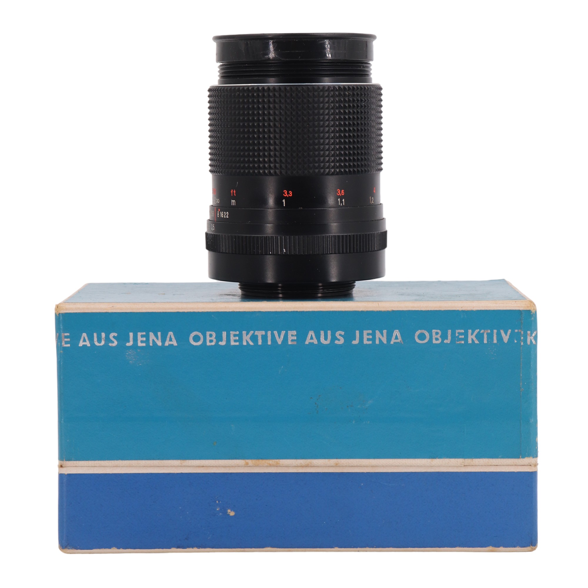 A boxed Carl Zeiss Jena DDR MC S 1:3,5 f=135 camera lens