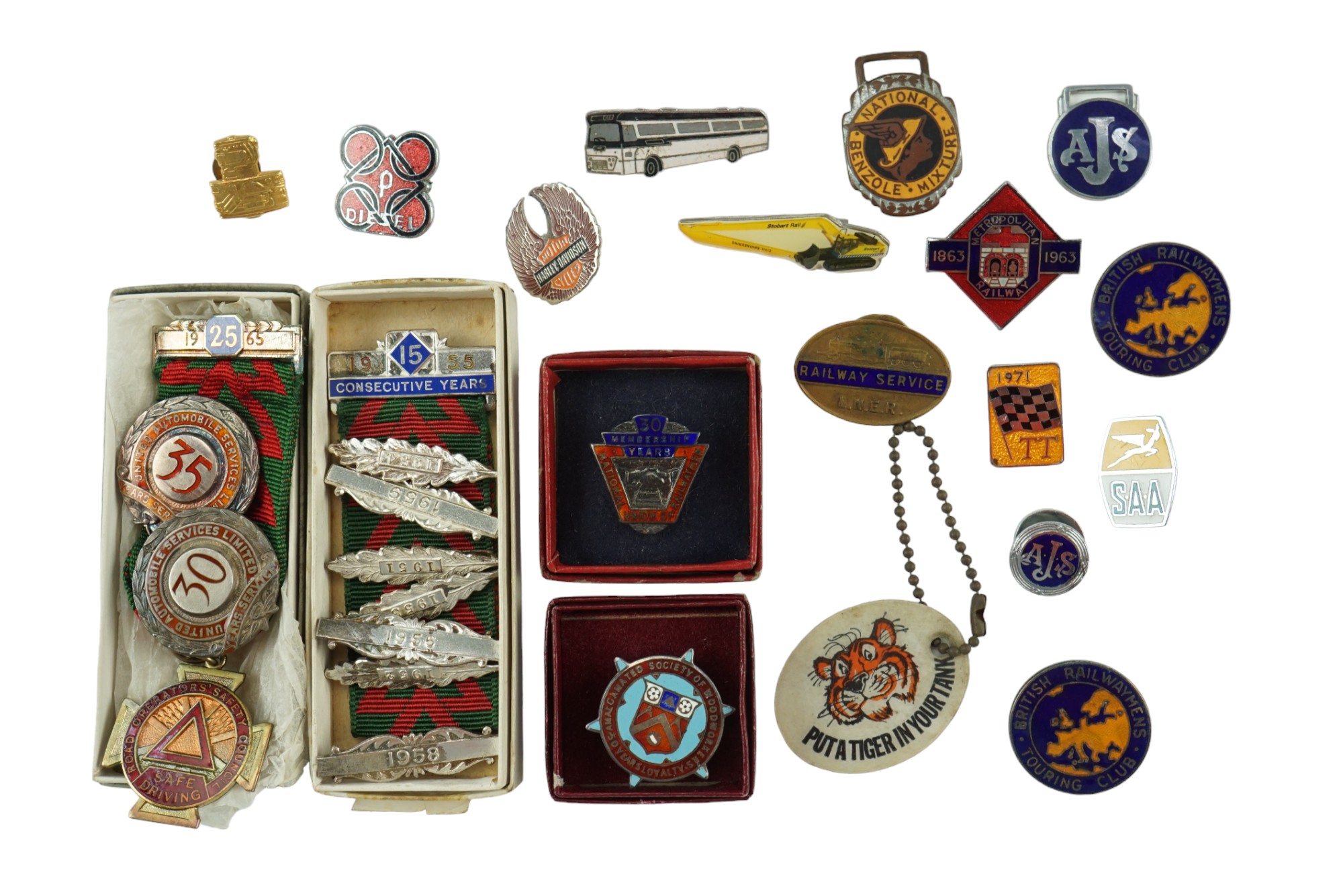 A group of vintage automobile /and transport medallions including Esso, South African Airways,