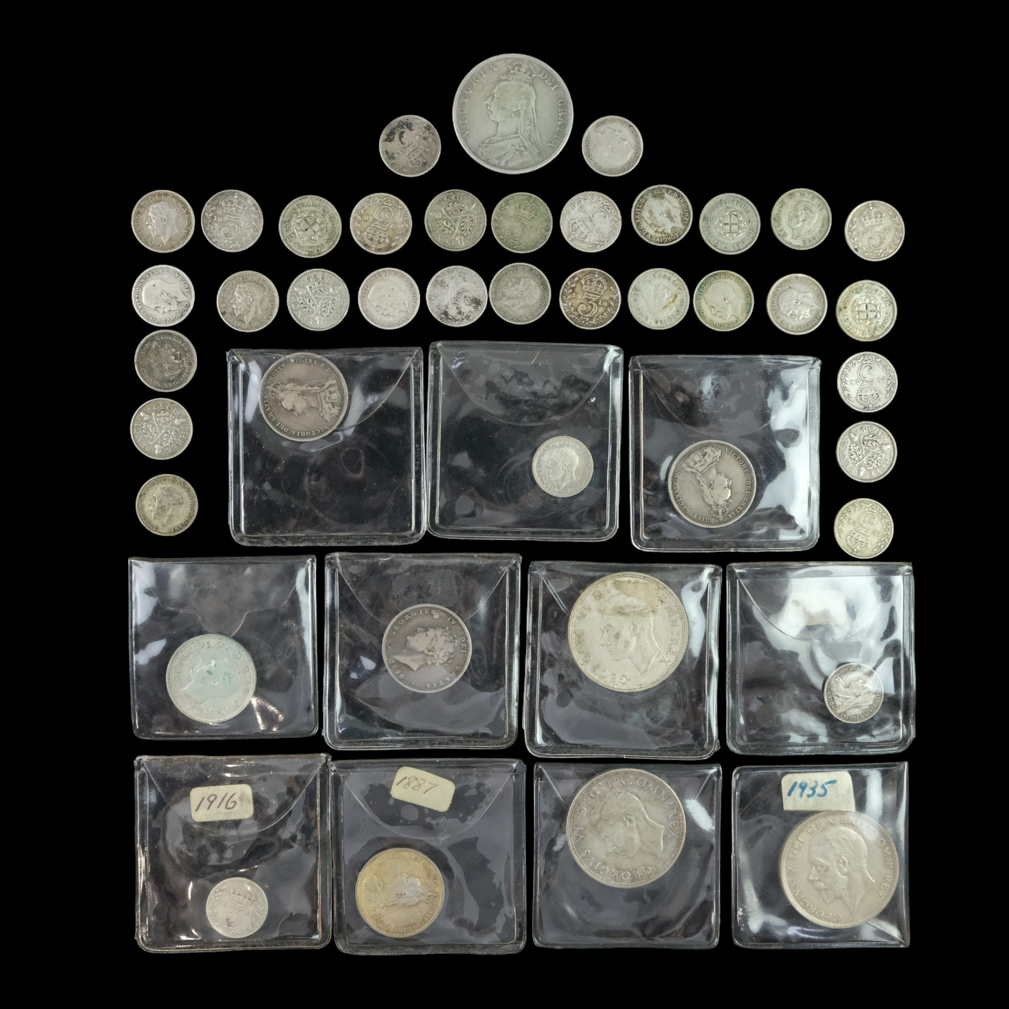 A group of Georgian and later GB silver coins comprising an 1826 shilling, 1888 half-crown, 1887