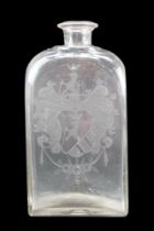 An early 19th Century free-blown glass decanter / flask, of shouldered form and rectangular section,