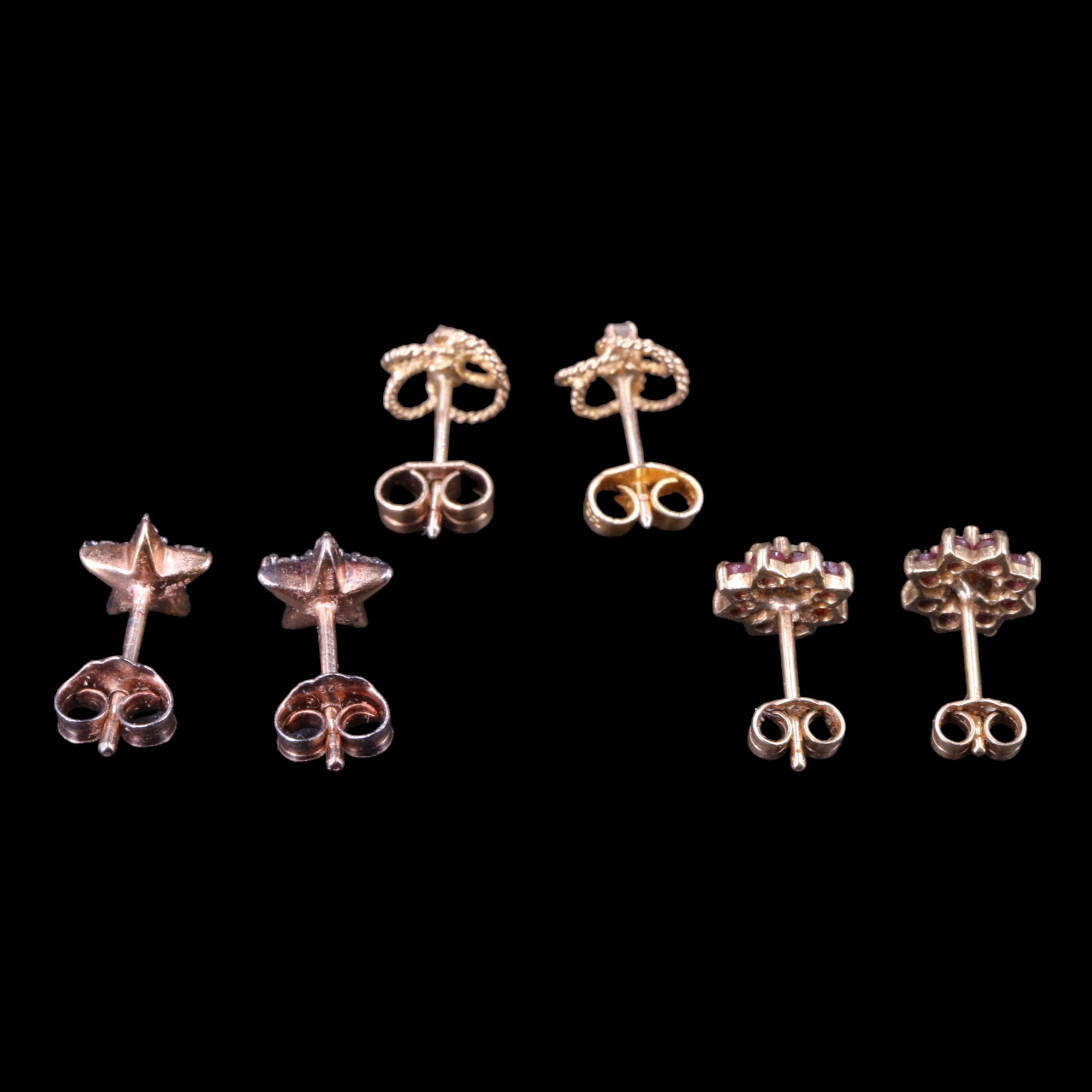 A pair of diamond and 9 ct gold openwork earrings, each small diamond set at the centre of four - Image 2 of 2