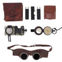 A Meridian Swiss combined sighting compass and inclinometer, in hide pouch with accessories,
