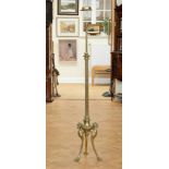 A late 19th / early 20th Century telescopic standard lamp, having lion's mask paw legs, converted to