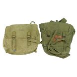 A Second World War US Army M 1936 Musette Pack together with Combat Pack