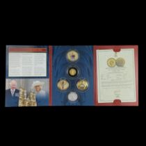 "The Coronation of His Majesty King Charles III" coin set comprising a 9 ct gold double crown, three