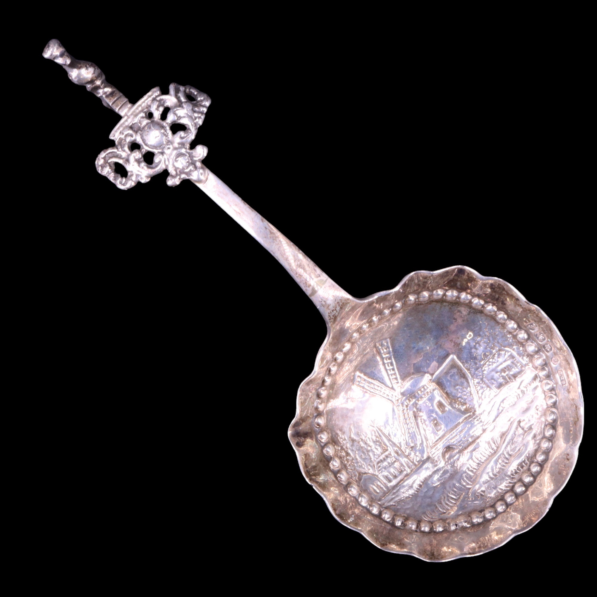 A 1920s Dutch silver caddy spoon, London import marks, 13 cm, 24 g