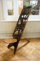 An African carved hardwood folding chair, 88 ch