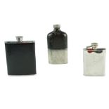 A Victorian hip flask together with a late 20th Century Jack Daniels and one other flask