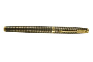 A vintage Parker 75 Cecile white-metal fountain pen, stamped "STERLING-VERMEIL CAP & BARRELL"