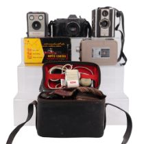 Three 1950s film and cine cameras comprising a cased Kodak Brownie Model I, a Coronot Twelve-20