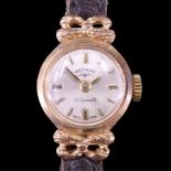 A lady's 1966 Rotary 9 ct gold wristlet watch, having a circular face with ribbon-bow lugs, 15