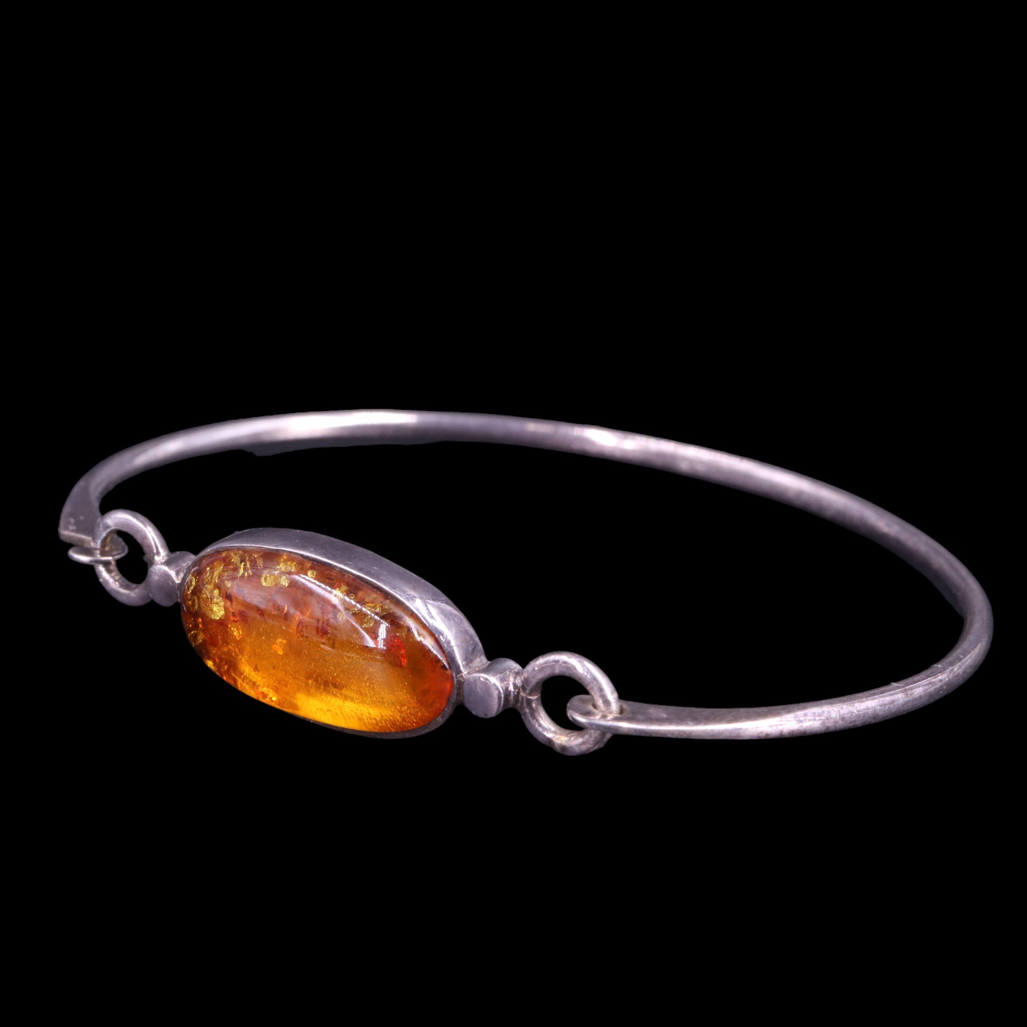 A collection of white metal mounted sun-spangled amber jewellery including a large asymmetric - Image 8 of 11