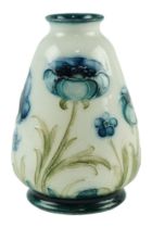 An early 20th Century William Moorcroft / James Macintyre & Co Florian Ware diminutive vase, of