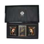 A Sobraine of London "The Art of Erté" playing cards set in a black and gilt lacquered box, box 28.5