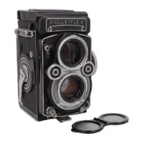 A Franke and Heidecke Rolleiflex 3.5F Model 4 twin lens reflex camera, having Carl Zeiss Planar 1: