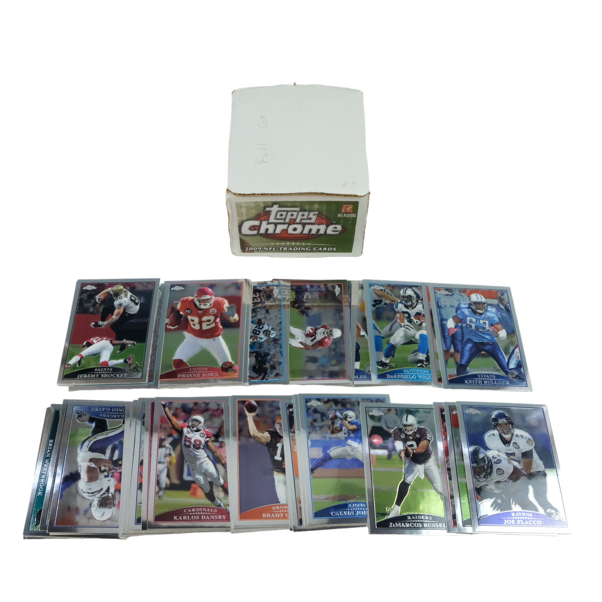 A collection of Topps Chrome 2009 NFL trading cards including Tom Brady (Patriots), Calvin