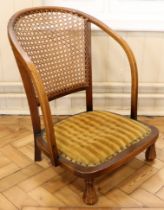 A 1930s Bergere / cane-backed open armchair