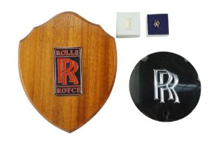 A Rolls Royce wall plaque, perspex plaque and a white metal tie stud, plaque 18 cm