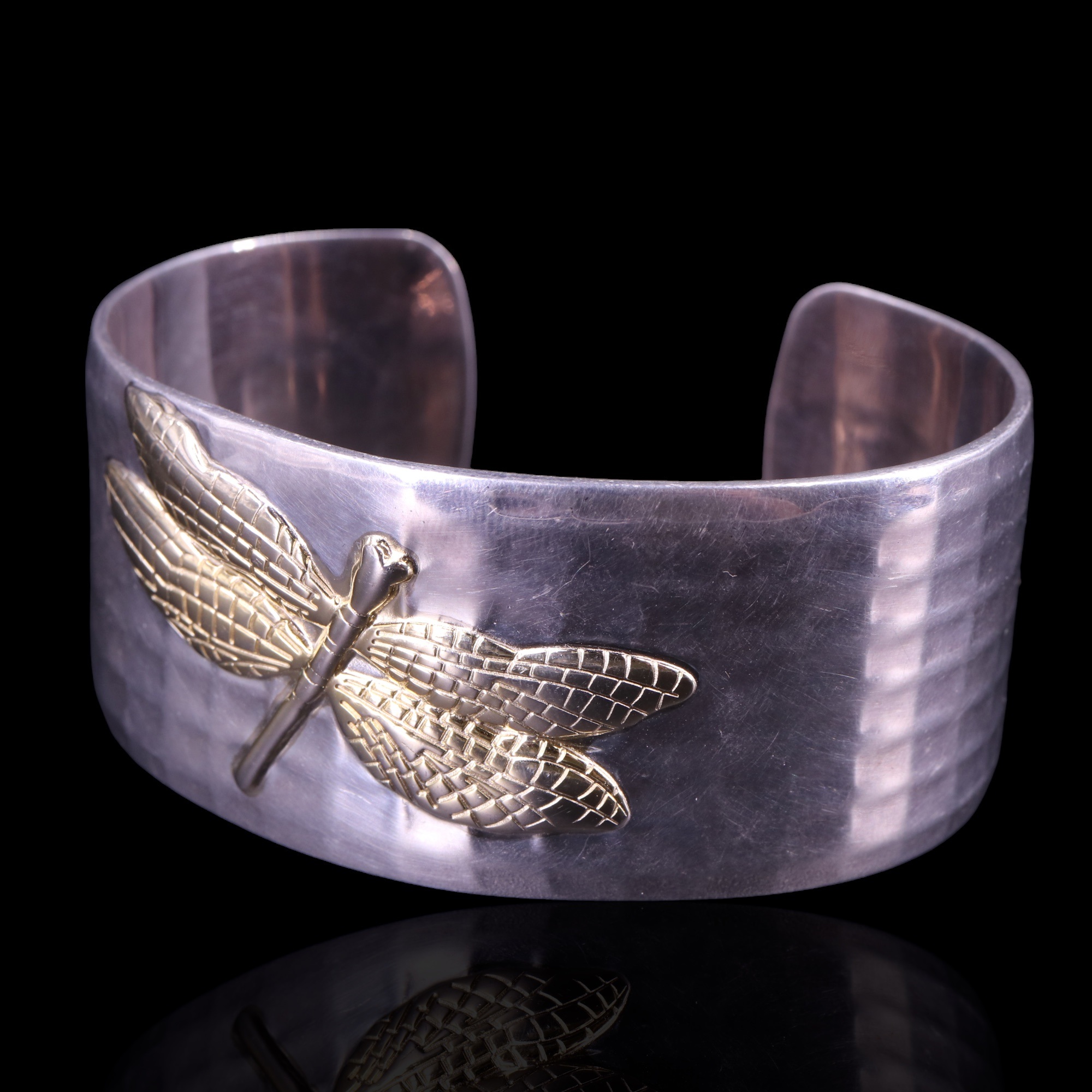 A contemporary Tiffany & Co yellow and white metal dragonfly bangle, stamped "2003 Tiffany & Co. 925