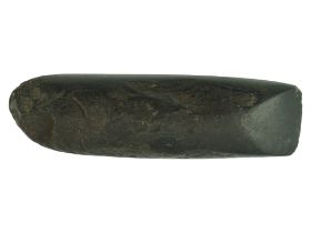 A Neolithic Langdale type semi-polished stone axehead, 15 cm