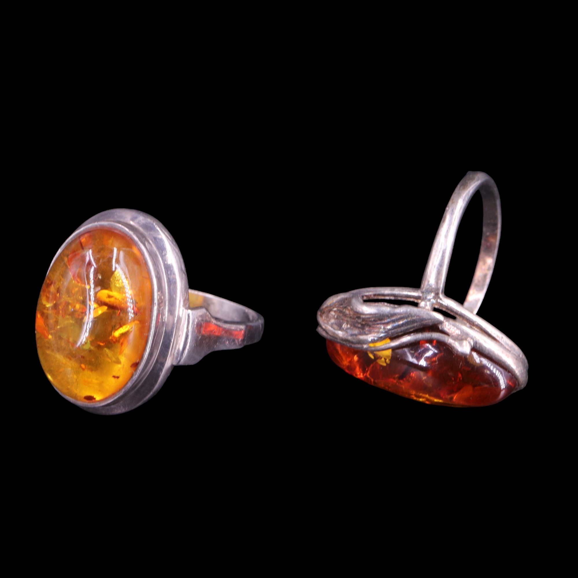 A collection of white metal mounted sun-spangled amber jewellery including a large asymmetric - Image 5 of 11