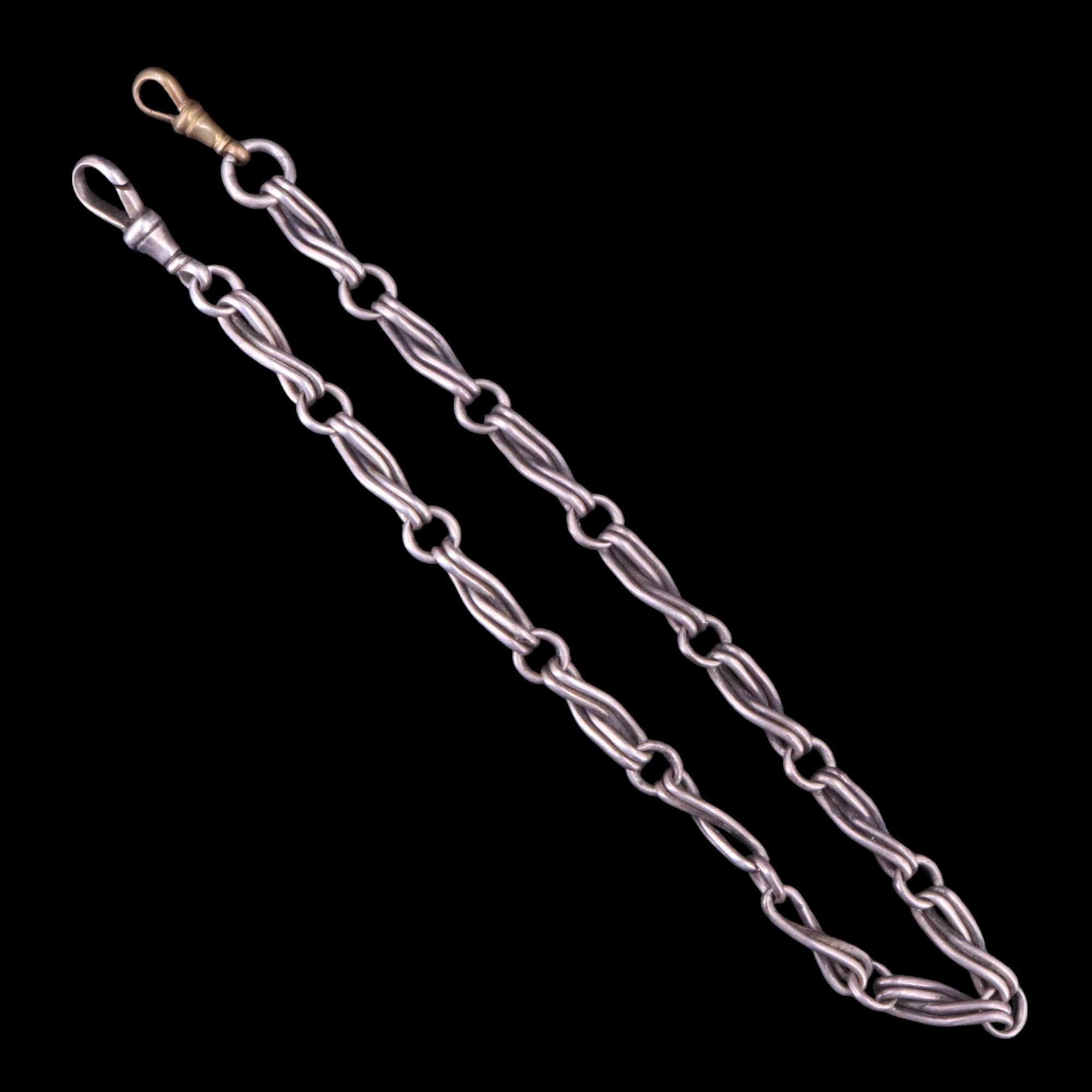 A Victorian silver fancy "infinity" link watch chain, 32 cm, 24 g