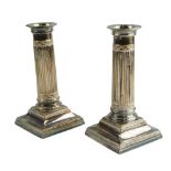 A pair of Victorian silver plated classical columnar candlesticks, 14 cm high Qty: 2