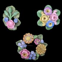 A late 19th / early 20th Century William Henry Goss floral porcelain brooch together with two