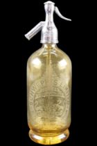 A Schweppes Ltd etched amber glass soda syphon, second quarter 20th Century