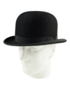A vintage "The City Hat" bowler hat, size 7 1/4