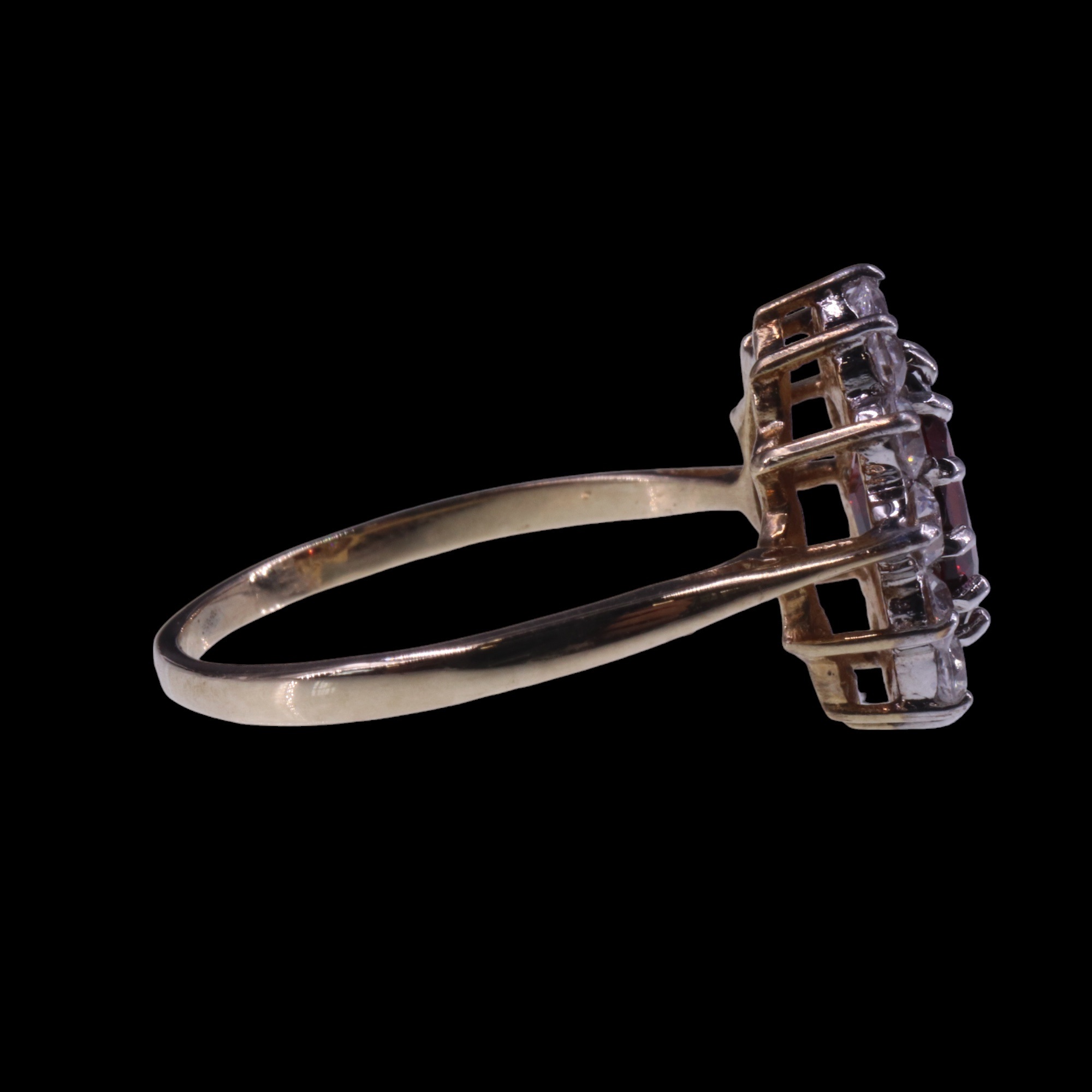 A 1980s garnet and white stone cluster ring, the central oval-cut garnet of approx. 1.4 cts, claw- - Image 3 of 5