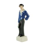 After Natalia Danko (Russian, 1892-1942) A 1920s Soviet Russian porcelain figurine of a soviet