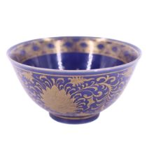 A Chinese powder-blue glazed and gilt porcelain bowl, the interior depicting a Longma reserved in