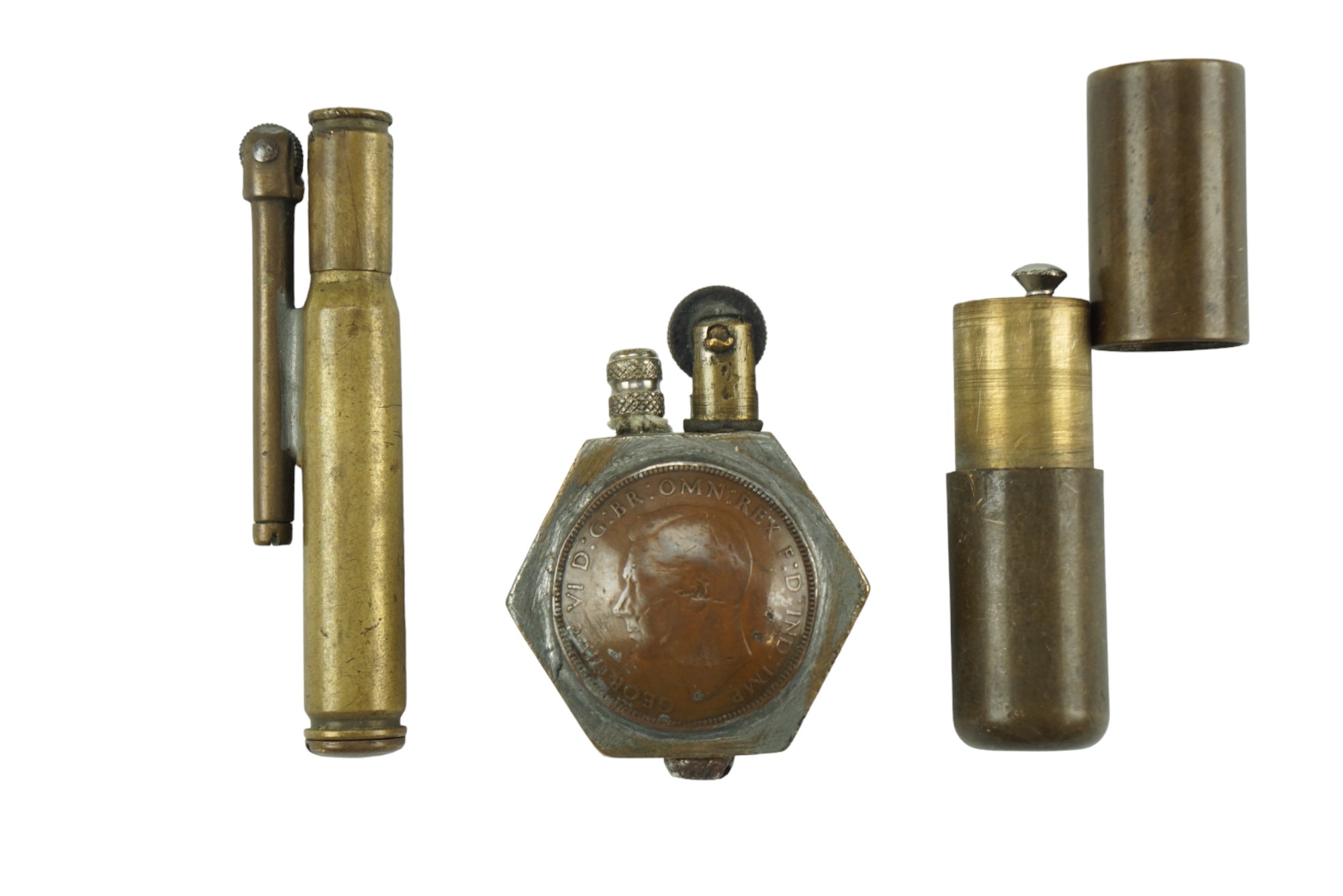 Three "trench art" cigarette lighters