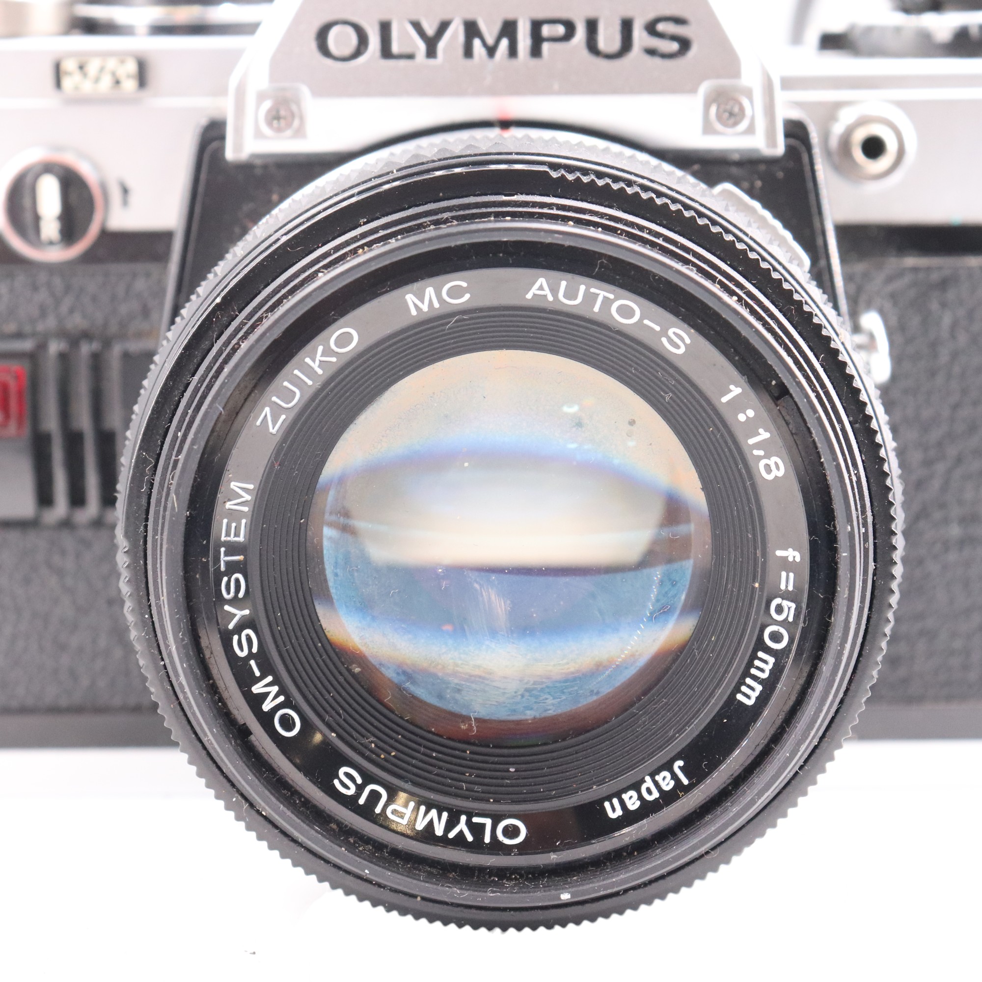 Two cased 1970s / 1980s 35 mm film cameras comprising an Olympus OM 10 and a Canon AV-1 together - Image 2 of 3