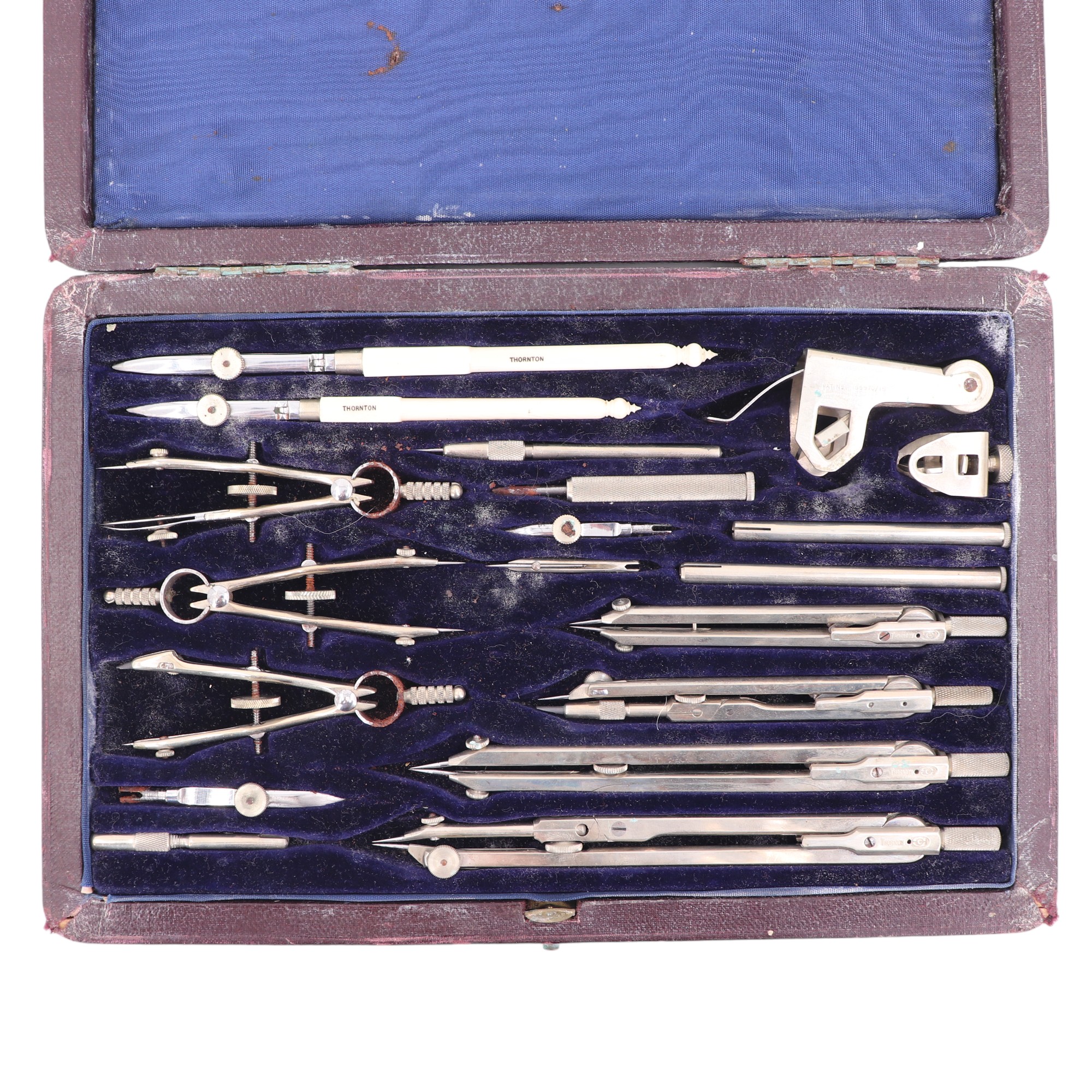 A cased set of A G Thornton draughtsman's drawing instruments, with two pens having ivory handles, - Image 3 of 3