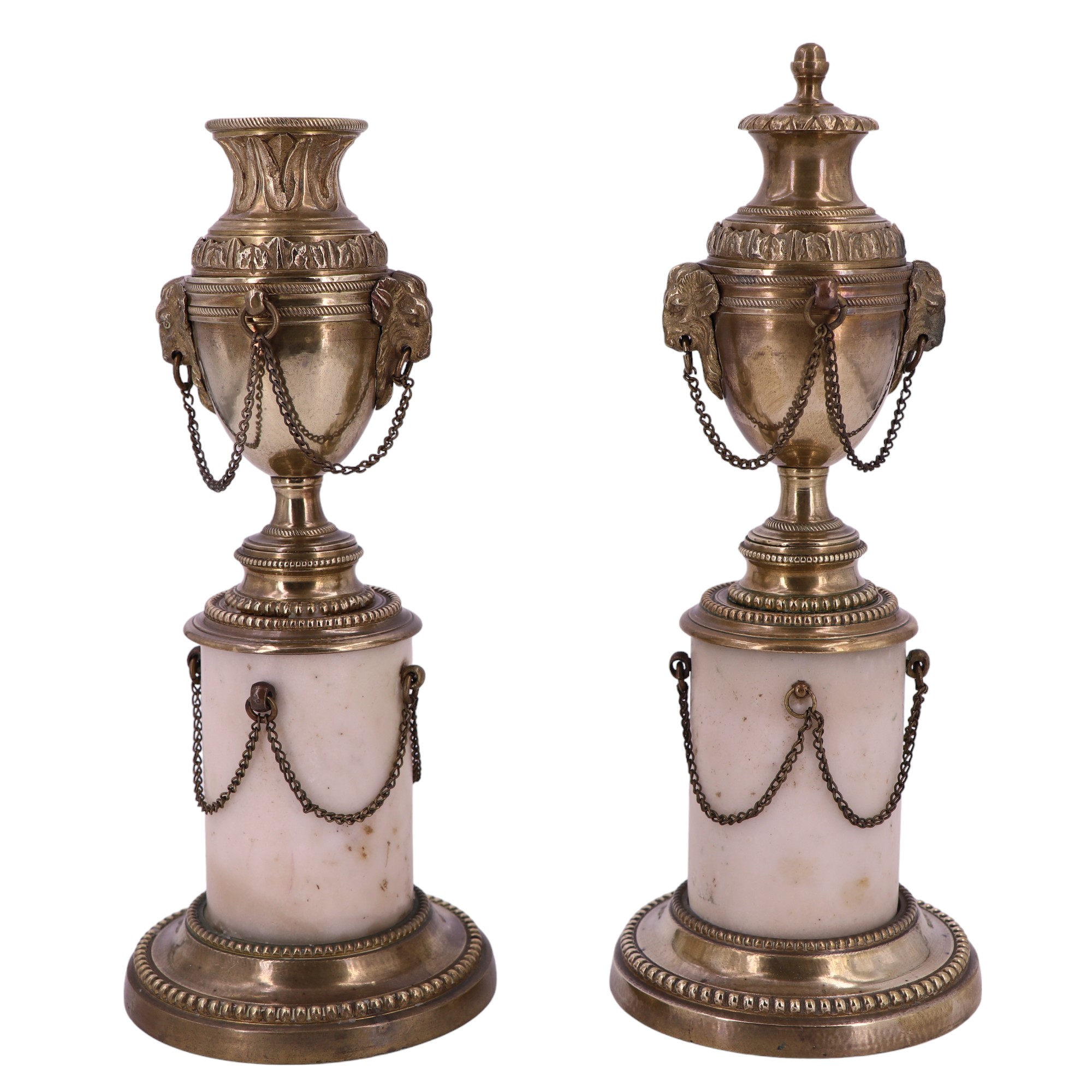 A pair of Louis XVI style brass and alabaster columnar candlesticks, each in the form of an