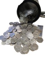 Tin containing a large collection of scarce 50p circulated collectors coins, including Olympics 2012