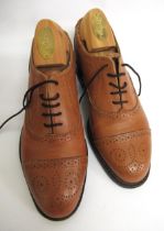 Pair of Samuel Windsor leather brogues, size 5 together with a red leather bag