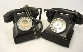 Two mid 20th Century black Bakelite telephones