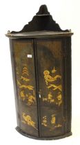 George III black and gilt chinoiserie decorated bow front hanging corner cabinet Clouding to lacquer
