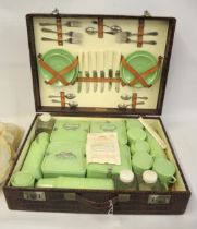 Mid 20th Century ' Coracle ' alligator leather picnic case, the hinged lid enclosing a fitted