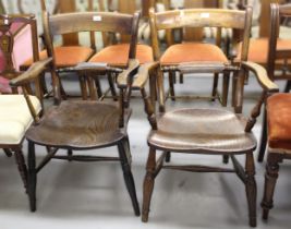 Two 19th Century rail back open arm kitchen chairs on turned supports Both in reasonably sound
