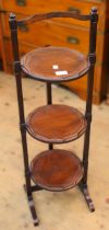 19th Century two shelf wall bracket with panelled doors, a three tier folding cakestand and an