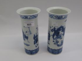 Pair of Chinese porcelain cylindrical flared rim vases, blue and white decorated with figures,