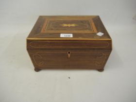 Regency mahogany and inlaid sarcophagus shaped work box with a hinged cover and bun feet, 27.5cm