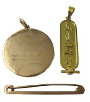 Unmarked yellow metal locket, 12.5g gross, together with an Egyptian yellow metal pendant, 2.5g